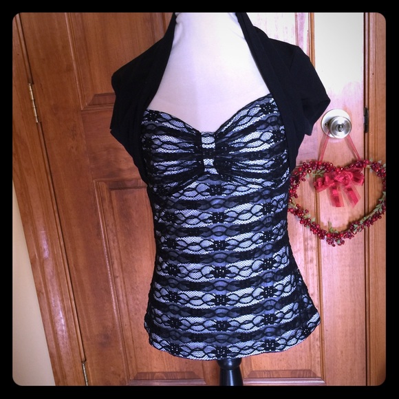 Black dress top with overlay design over white. - Picture 2 of 4